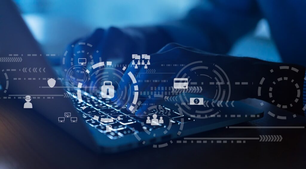 Platform migration - A person types on a laptop with digital security icons overlaid. 
